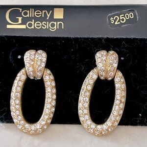 Vintage Gallery Design gold and diamond (costume) dangle earrings.